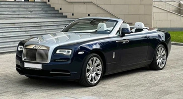 Rent a Rolls Royce Dawn with driver in Dubai for ultimate luxury. Enjoy VIP chauffeur services, private city tours, airport transfers, and premium travel experiences.
